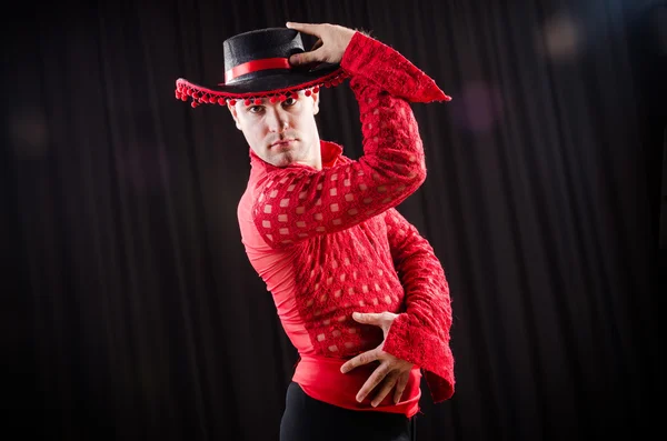 Hombre bailando baile español en ropa roja —  Fotos de Stock