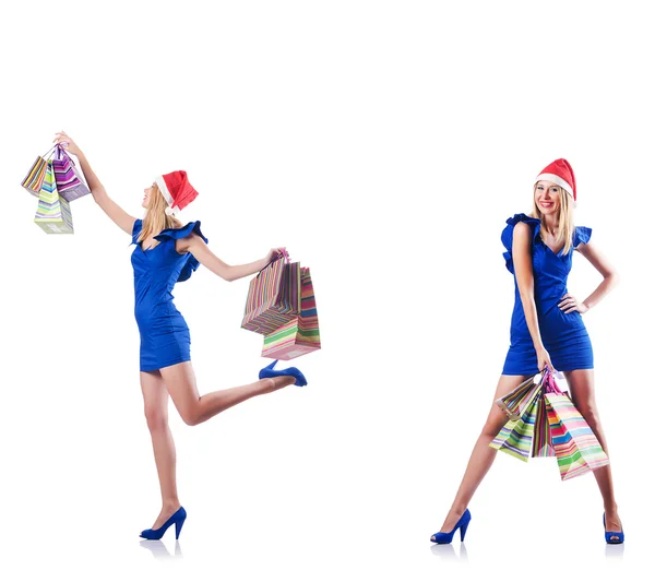 Femme avec des sacs à provisions isolés sur blanc — Photo