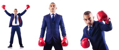 Boks eldivenli yakışıklı bir iş adamı.