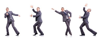 Dansçı iş adamı beyazlar içinde.