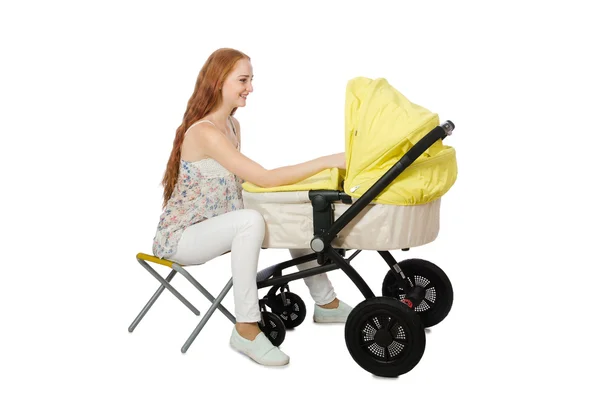 Woman with baby and pram isolated on white — Stock Photo, Image