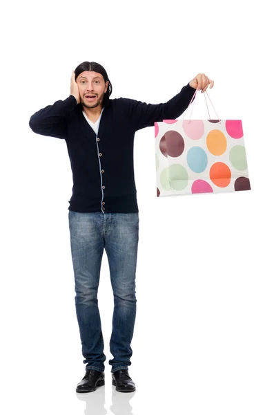 Young man holding plastic bags isolated on white — Stock Photo, Image