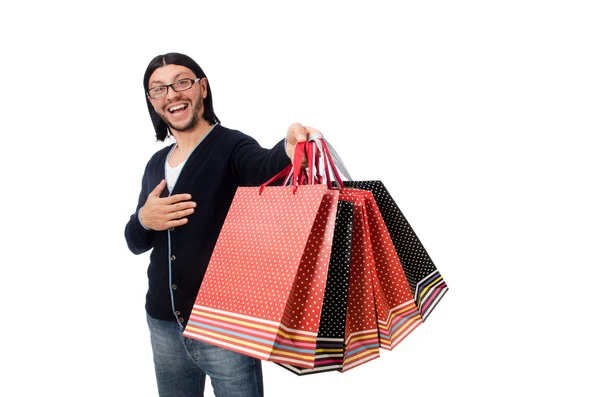 Joven sosteniendo bolsas de plástico aisladas en blanco —  Fotos de Stock