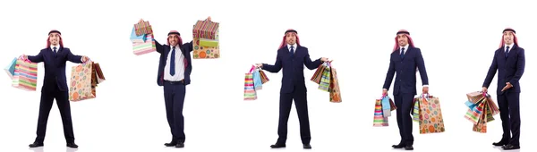 Arab man with shopping gifts on white — Stock Photo, Image