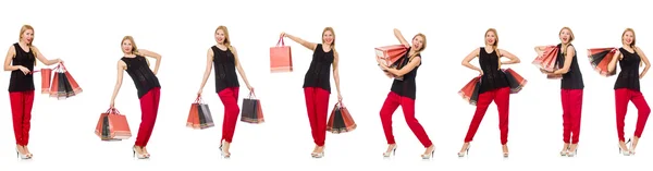Комплект женщины с пакетами покупок на белом — стоковое фото