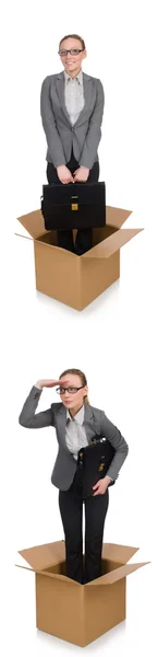 Composite image of woman with boxes on white — Stock Photo, Image