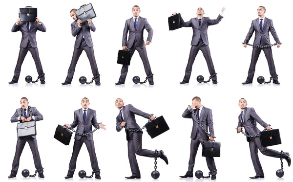 Businessman with shackles on white — Stock Photo, Image