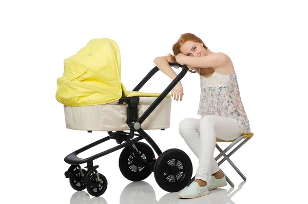 Frau mit Baby und Kinderwagen isoliert auf weißem Grund — Stockfoto