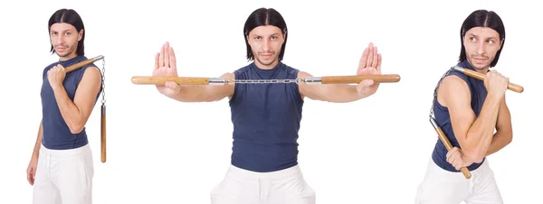 Rolig karate fighter med nunchuckar på vitt — Stockfoto