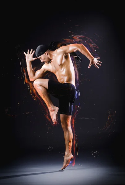 Dancer dancing dances on the background — Stock Photo, Image