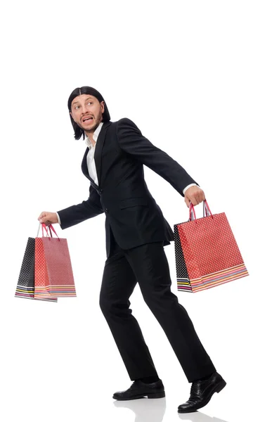 Traje negro hombre sosteniendo bolsas de plástico aisladas en blanco —  Fotos de Stock