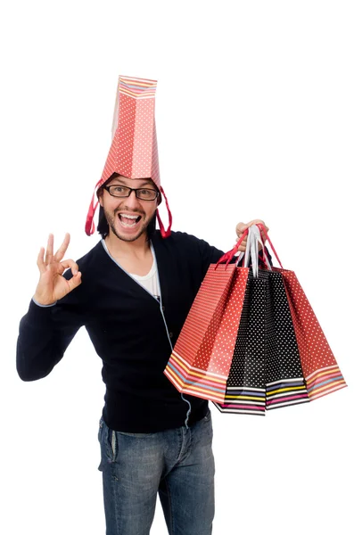 Young man holding plastic bags isolated on white — Stock Photo, Image