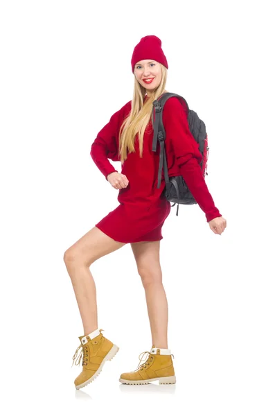 Menina bonita em vestido vermelho e mochila isolada no branco — Fotografia de Stock