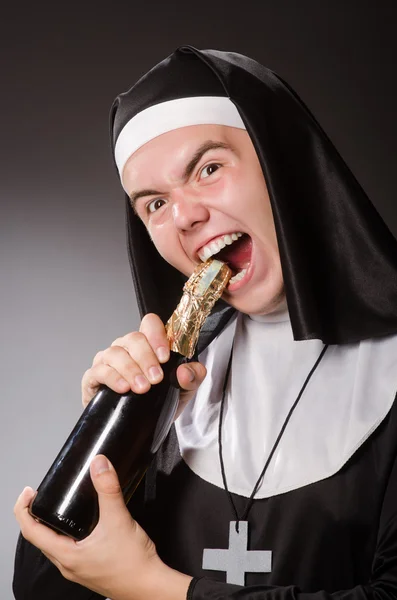 Funny man wearing nun clothing — Stock Photo, Image