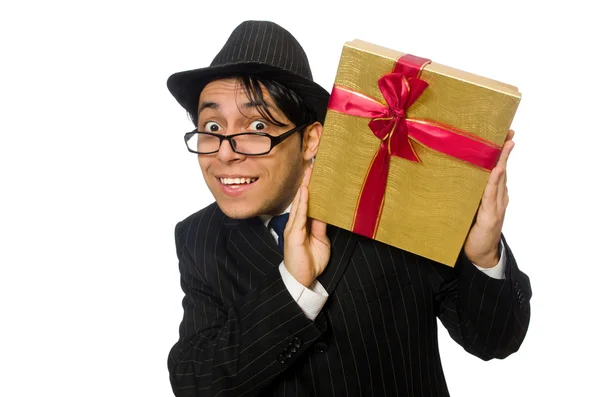 Grappige mens met geschenkdoos op wit — Stockfoto