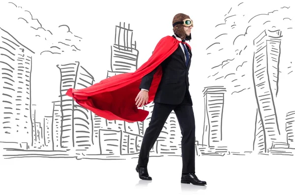 Man in red cover with skyscapers at the background — Stock Photo, Image