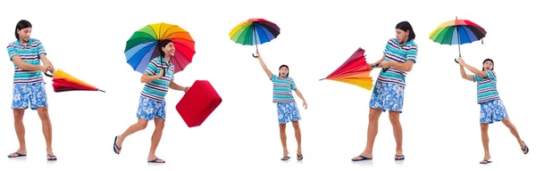 Reiziger met rode koffer en paraplu geïsoleerd op wit — Stockfoto