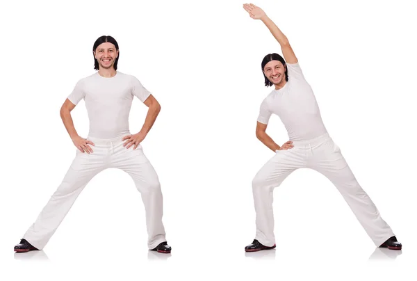 Ein Mann in weißer Sportbekleidung isoliert auf weißem Grund — Stockfoto
