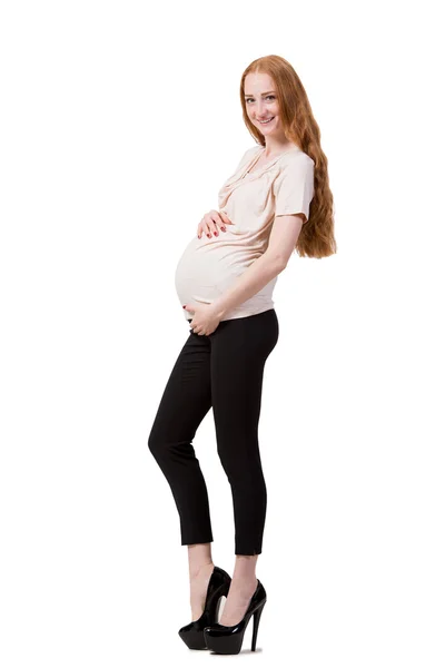 Jeune femme enceinte isolée sur blanc — Photo