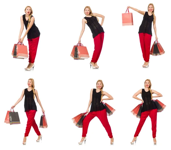 Ensemble de femme avec sacs à provisions sur blanc — Photo