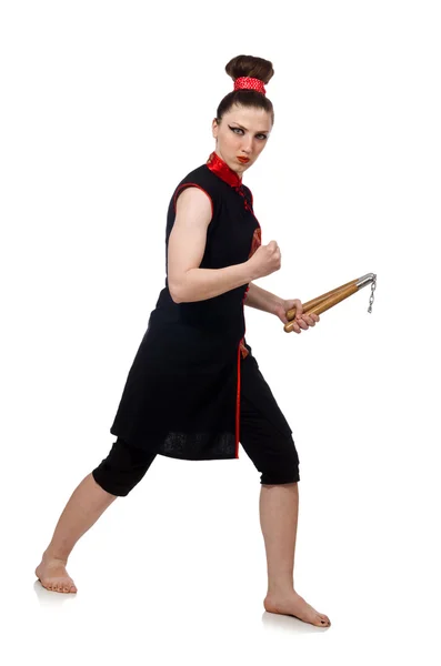 Funny woman with nunchucks isolated on white — Stock Photo, Image