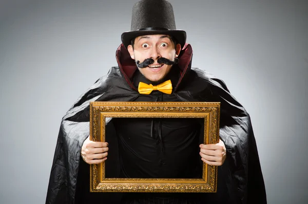 Funny man with picture frame — Stock Photo, Image