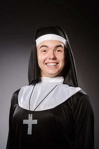 Funny man wearing nun clothing — Stock Photo, Image