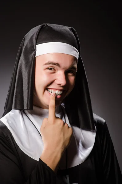 Funny man wearing nun clothing — Stock Photo, Image