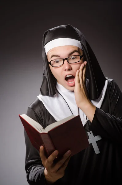 Funny man wearing nun clothing — Stock Photo, Image