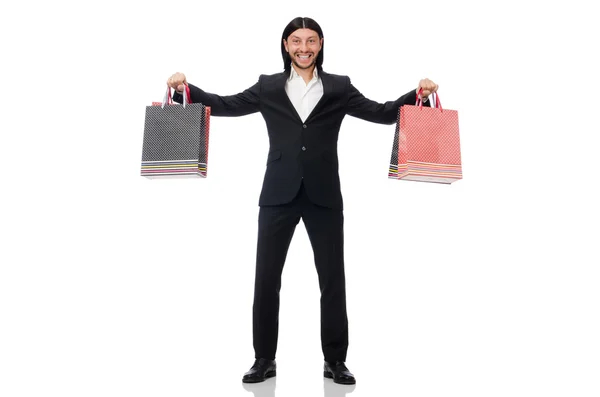 Traje negro hombre sosteniendo bolsas de plástico aisladas en blanco —  Fotos de Stock