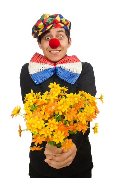 Buffo clown con fiori isolati su bianco — Foto Stock