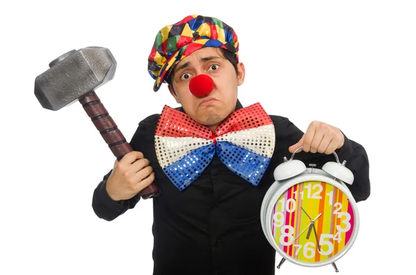 Grappige clown met hamer en klok op wit — Stockfoto