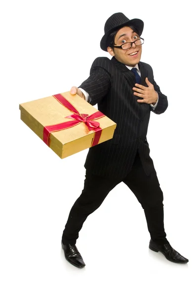 Смешной человек с подарочной коробкой на белом — стоковое фото