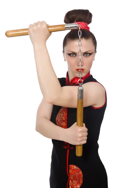 Donna divertente con nunchaku isolati su bianco — Foto Stock