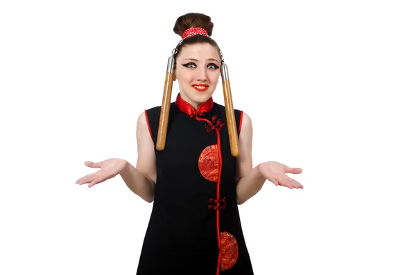 Funny woman with nunchucks isolated on white — Stock Photo, Image