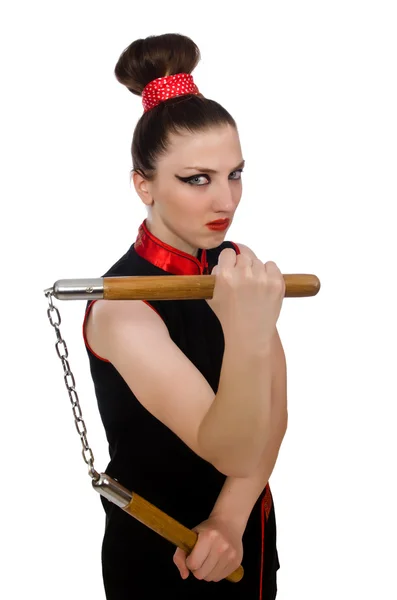 Funny woman with nunchucks isolated on white — Stock Photo, Image