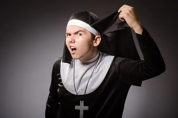 Funny man wearing nun clothing — Stock Photo, Image