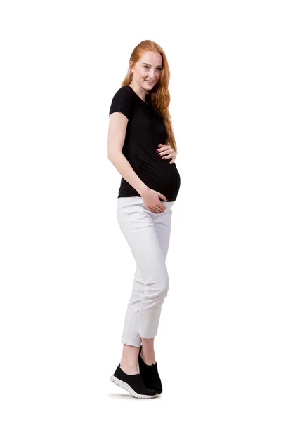 Jeune femme enceinte isolée sur blanc — Photo