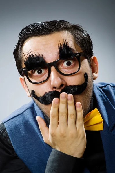 Funny man against dark background — Stock Photo, Image