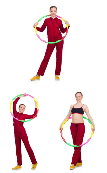 用呼啦圈做运动的妇女 — 图库照片