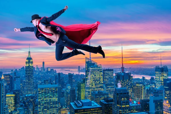 Superman and the city in concept — Stock Photo, Image