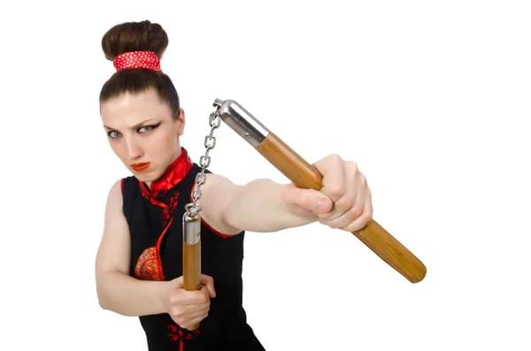 Funny woman with nunchucks isolated on white — Stock Photo, Image