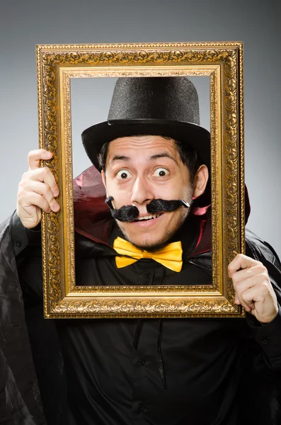 Funny man with picture frame — Stock Photo, Image
