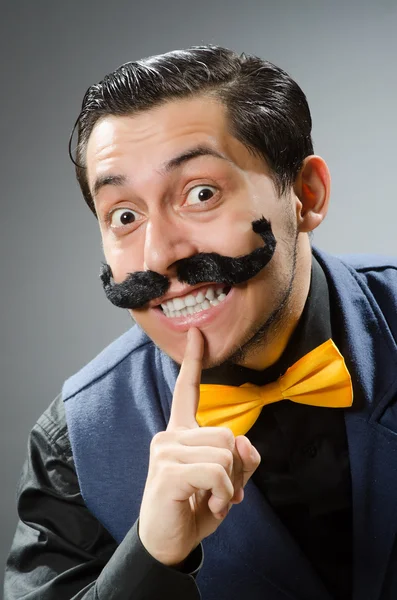 Funny man against dark background — Stock Photo, Image