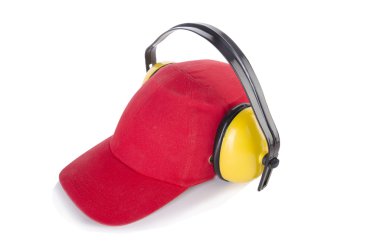 Red baseball cap with noise headphones isolated on white clipart