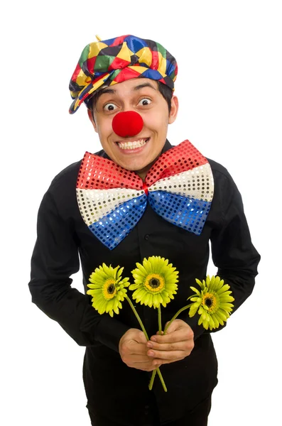 Drôle de clown avec des fleurs isolées sur blanc — Photo