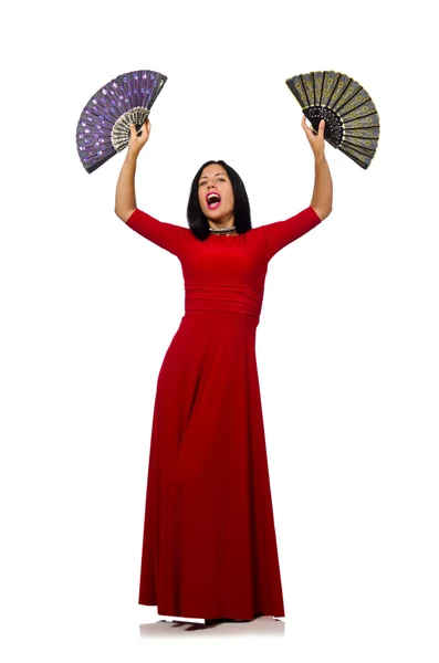 Žena v červených šatech s ventilátorem izolovaných na bílém — Stock fotografie