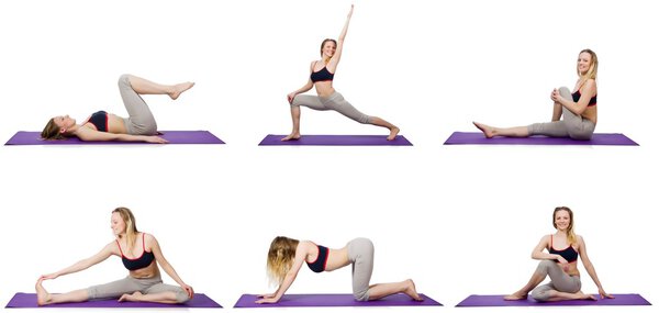 Young female doing exercises on white