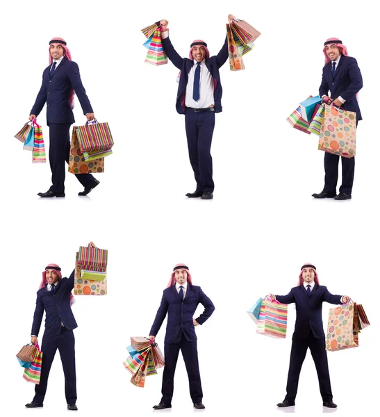 Arab man with shopping gifts on white — Stock Photo, Image