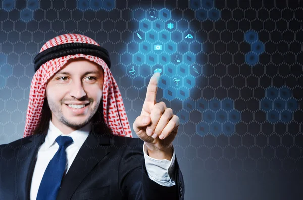 Arab businessman pressing virtual buttons — Stock Photo, Image